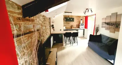 Coin salon dans l'établissement Appartement de Charme - Centre Ville