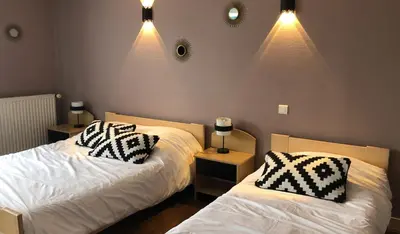 Un ou plusieurs lits dans un hébergement de l'établissement Auberge Armoricaine