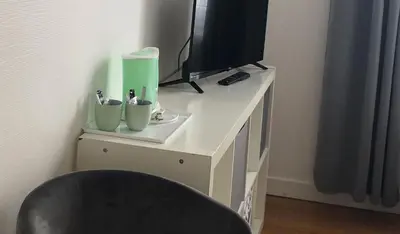 Télévision ou salle de divertissement dans l'établissement Auberge Armoricaine