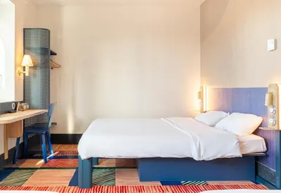 Un ou plusieurs lits dans un hébergement de l'établissement B&B HOTEL Nantes Centre