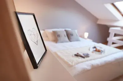 Un ou plusieurs lits dans un hébergement de l'établissement Au Coeur de Nantes Apartment