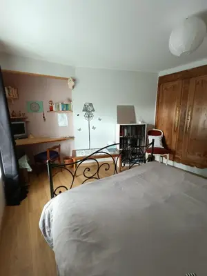 Un ou plusieurs lits dans un hébergement de l'établissement Maison De Village