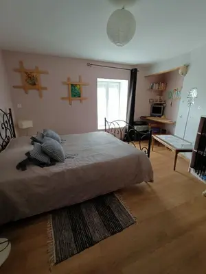 Un ou plusieurs lits dans un hébergement de l'établissement Maison De Village