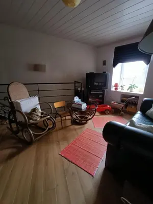 Télévision ou salle de divertissement dans l'établissement Maison De Village