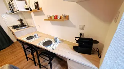Cuisine ou kitchenette dans l'établissement Studio du 104