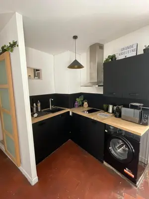 Cuisine ou kitchenette dans l'établissement La Grande Madeleine
