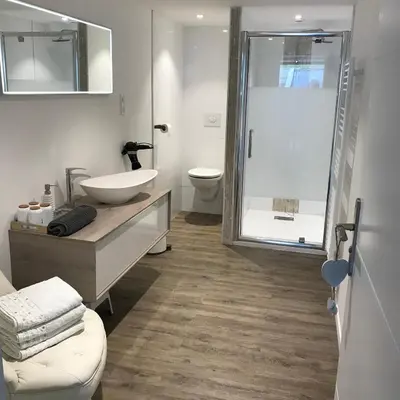 Salle de bains dans l'établissement L'hetre