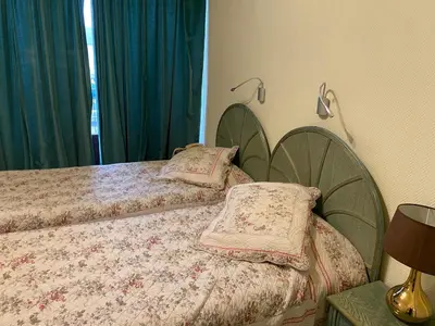 Un ou plusieurs lits dans un hébergement de l'établissement Cit'Hotel Marie Stuart
