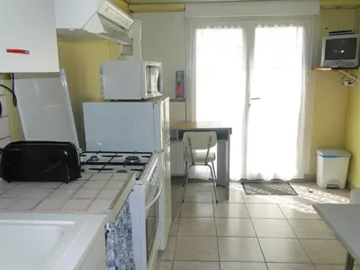 Cuisine ou kitchenette dans l'établissement Gîte Debussy