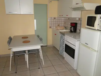 Cuisine ou kitchenette dans l'établissement Gîte Debussy