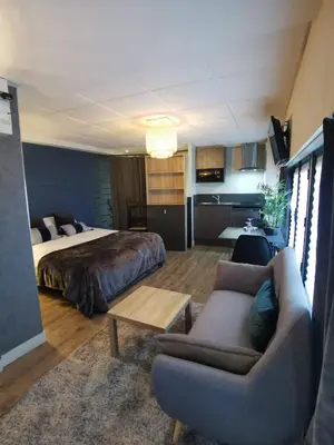 Coin salon dans l'établissement Au Saint Martin 2