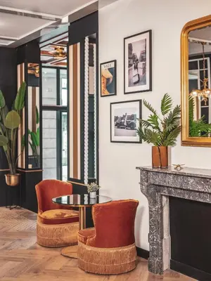 Coin salon dans l'établissement Billie Hôtel