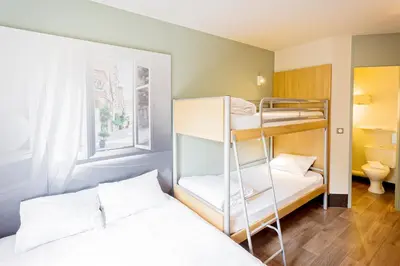 Un ou plusieurs lits dans un hébergement de l'établissement B&B HOTEL Nantes Rezé St Sébastien