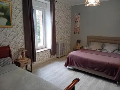 Un ou plusieurs lits dans un hébergement de l'établissement Les hortensias