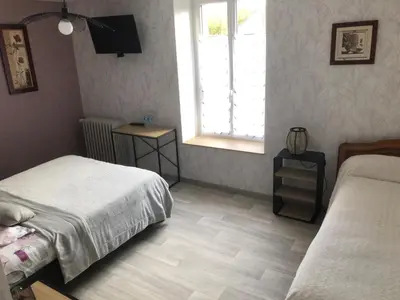 Un ou plusieurs lits dans un hébergement de l'établissement Les hortensias