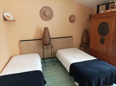 Un ou plusieurs lits dans un hébergement de l'établissement Chez Pierre et Caroline