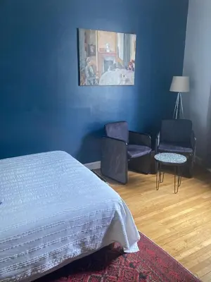 Un ou plusieurs lits dans un hébergement de l'établissement Chambre d'hôtes La grotte de Voltaire