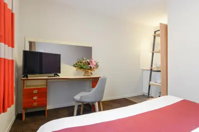 Télévision ou salle de divertissement dans l'établissement Appart'City Classic Nantes Viarme