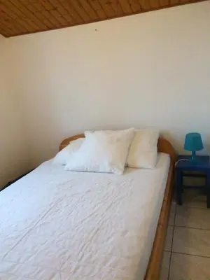 Un ou plusieurs lits dans un hébergement de l'établissement Maison vacances Noirmoutier Barbatre