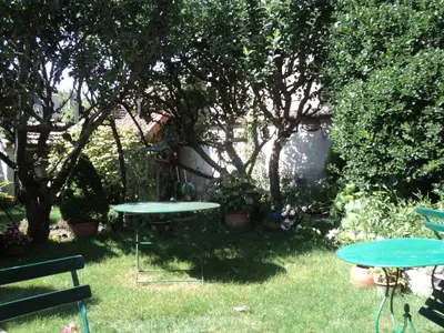 Jardin de l'établissement Appartement