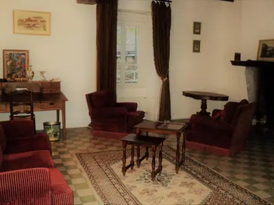Coin salon dans l'établissement Appartement