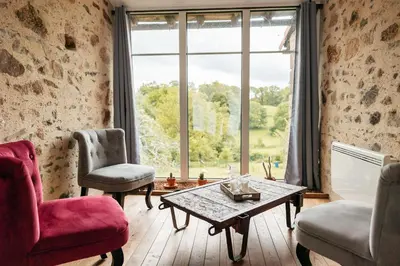 Coin salon dans l'établissement Le Logis Du Prieure