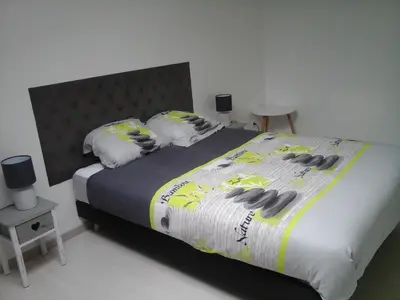 Un ou plusieurs lits dans un hébergement de l'établissement Maison au calme