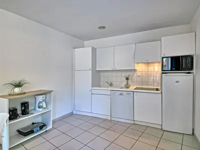 Cuisine ou kitchenette dans l'établissement Holiday Home Hameau Océan-3 by Interhome