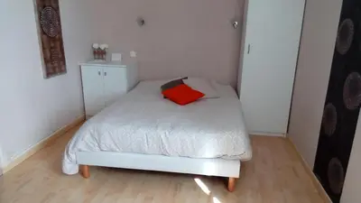 Un ou plusieurs lits dans un hébergement de l'établissement Chambres des Noels