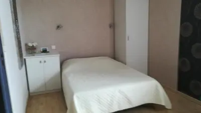 Un ou plusieurs lits dans un hébergement de l'établissement Chambres des Noels