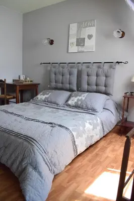 Un ou plusieurs lits dans un hébergement de l'établissement Chambres d'hôtes 