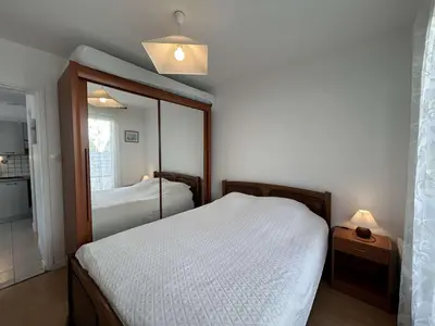 Un ou plusieurs lits dans un hébergement de l'établissement Maison de Vacances avec Terrasse Dallée, 6 Couchages, à Deux Pas de l'Océan à St-Jean-de-Monts - FR-1-224C-94