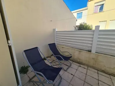 Balcon ou terrasse dans l'établissement Maison de Vacances avec Terrasse Dallée, 6 Couchages, à Deux Pas de l'Océan à St-Jean-de-Monts - FR-1-224C-94