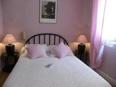 Un ou plusieurs lits dans un hébergement de l'établissement Hôtel Le Cambronne