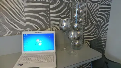 Télévision ou salle de divertissement dans l'établissement Hôtel Le Cambronne