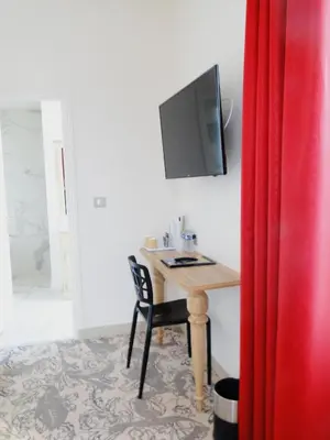 Télévision ou salle de divertissement dans l'établissement Domaine de La Ferrière