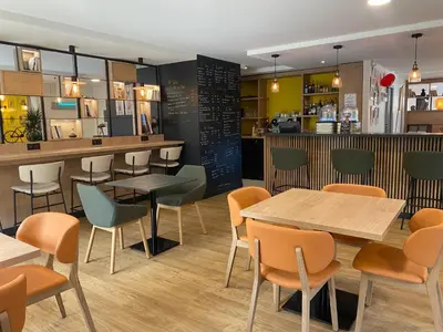 Restaurant ou autre lieu de restauration dans l'établissement Première Classe Nantes Sud - Rezé Aéroport