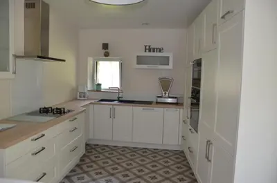 Cuisine ou kitchenette dans l'établissement La Remise 4 étoiles