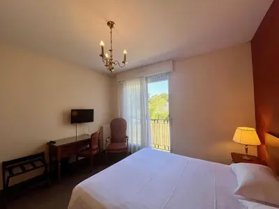 Un ou plusieurs lits dans un hébergement de l'établissement Hôtel de la Marine