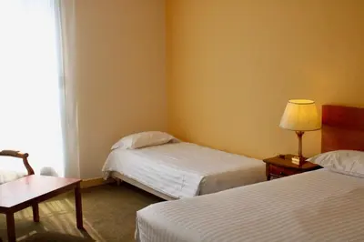 Un ou plusieurs lits dans un hébergement de l'établissement Hôtel de la Marine