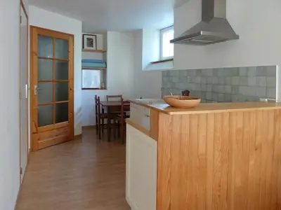 Cuisine ou kitchenette dans l'établissement maison La Marche