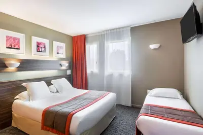 Un ou plusieurs lits dans un hébergement de l'établissement Best Western Hotel Nuit De Retz Nantes Sud