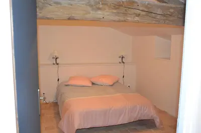 Un ou plusieurs lits dans un hébergement de l'établissement Gîte au Haras