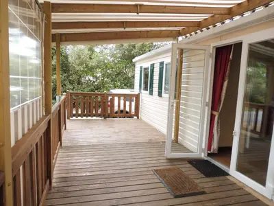 Balcon ou terrasse dans l'établissement Mobile Home bois dormant