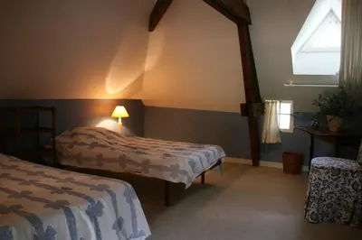 Un ou plusieurs lits dans un hébergement de l'établissement Le Loft du Grand Saulaie
