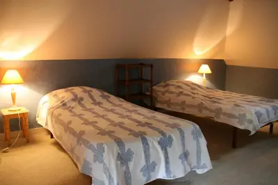 Un ou plusieurs lits dans un hébergement de l'établissement Le Loft du Grand Saulaie