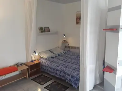Un ou plusieurs lits dans un hébergement de l'établissement Grand studio sur jardin Nantes Beaujoire B