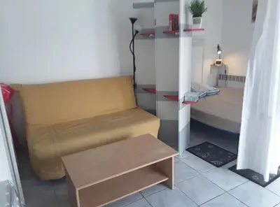 Coin salon dans l'établissement Grand studio sur jardin Nantes Beaujoire B