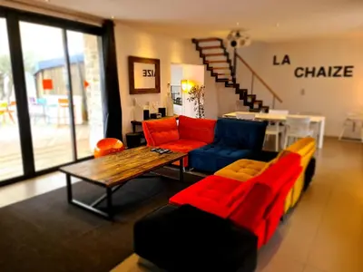 Coin salon dans l'établissement La Chaize - Villa, Suites & Spa