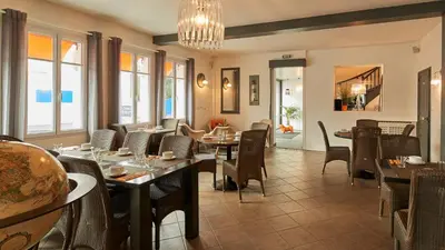 Coin salon dans l'établissement La Chaize - Villa, Suites & Spa
